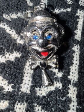 Vintage Monet  Clown Pendant with Blue Eyes and Red Tongue mechanical